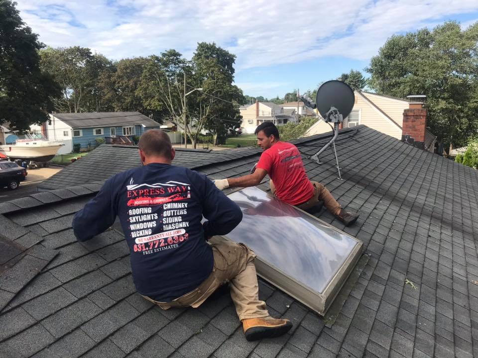 men working on the roof