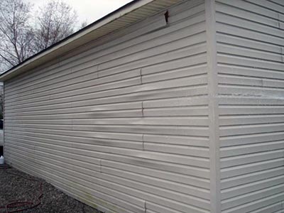 bad leaky house siding picture