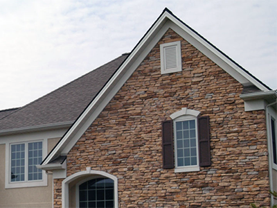 New House Siding Of Bricks