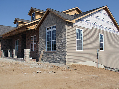 New House Siding Of Bricks