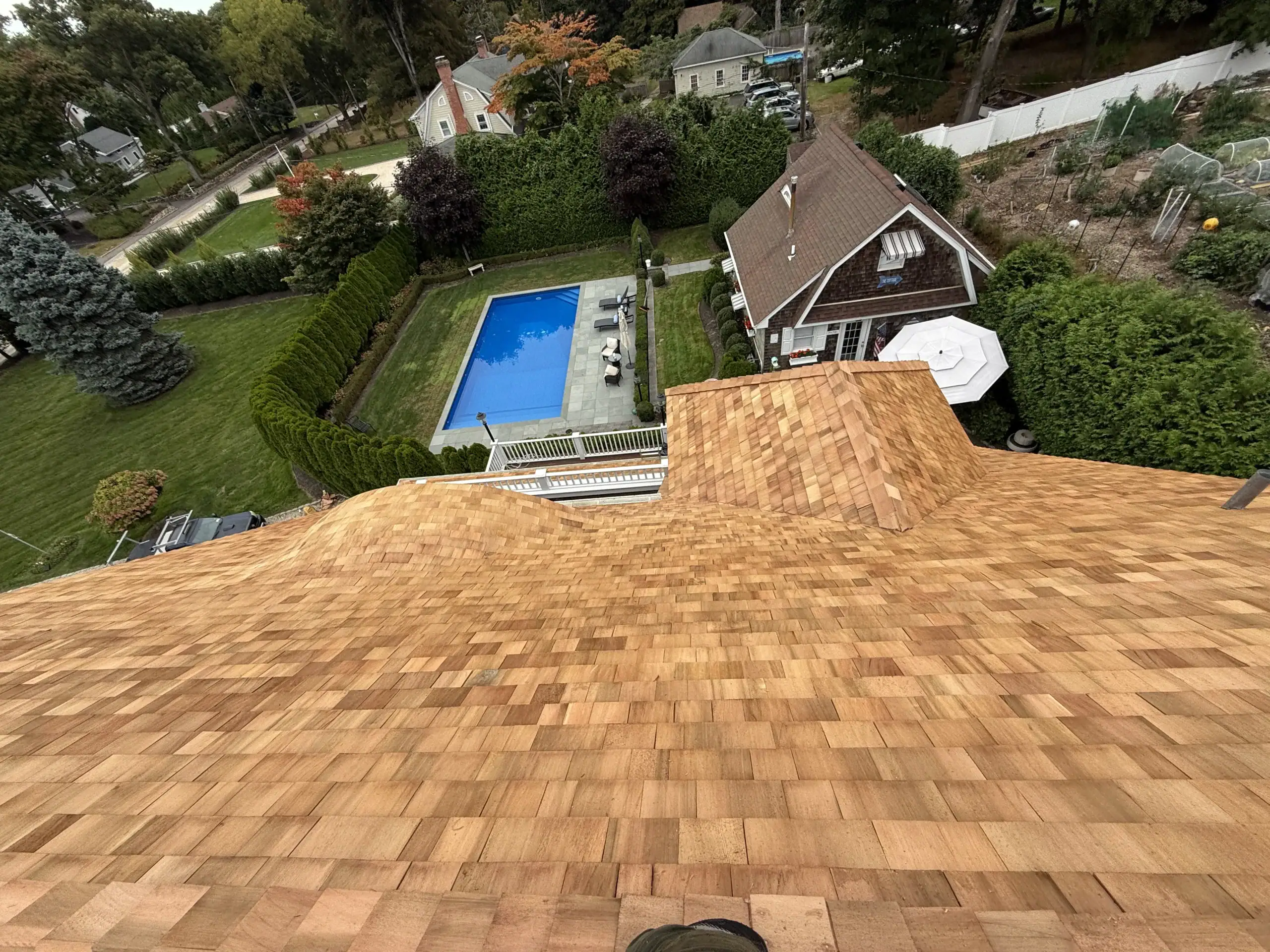 New cedar shake roof completed rooftop view Long Island